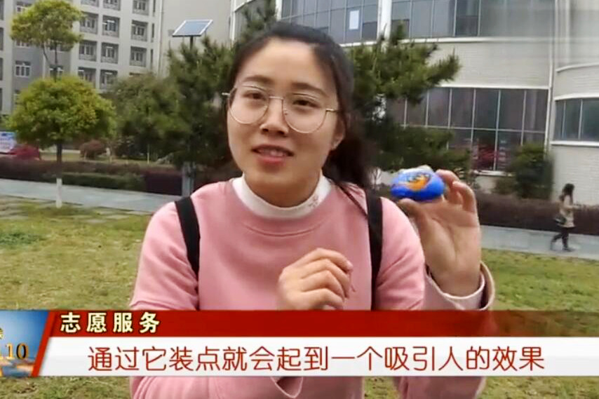 米兰milan官方网站：彩绘石头吸引眼球，爱心志愿者助山区孩子